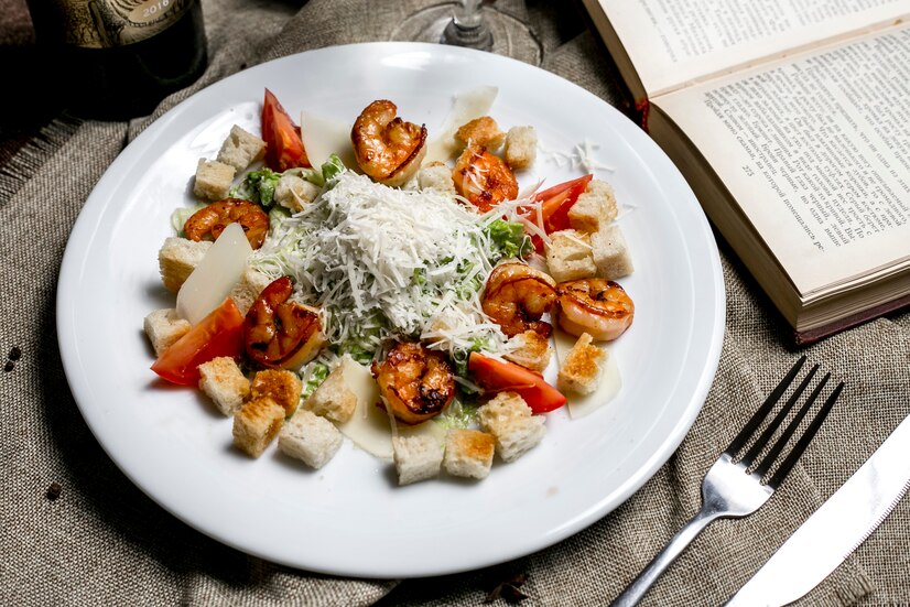 Bowl of fresh burrata cheese salad with vibrant greens and ripe cherry tomatoes, perfect for a healthy and delicious meal